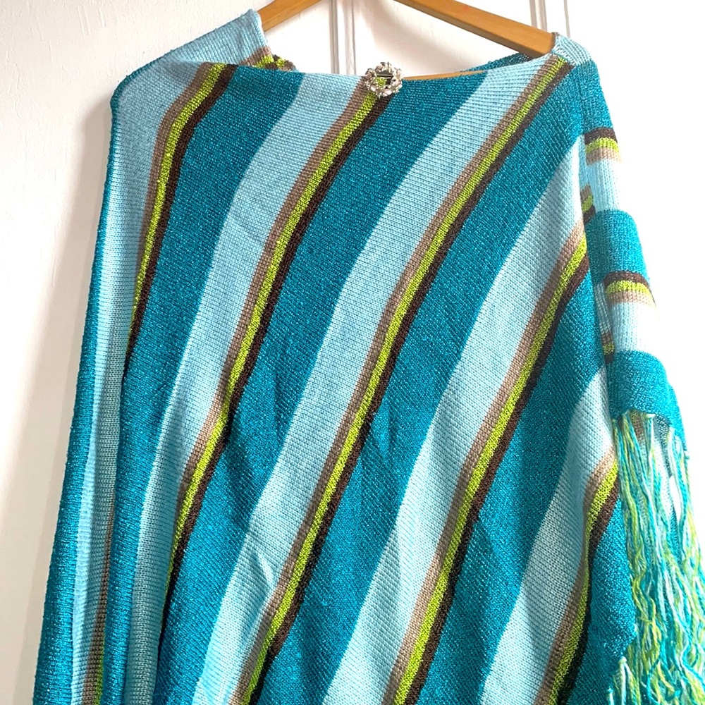 Pull over Shawl With Fringe Detail Size: One size